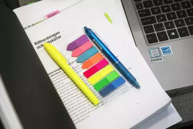 Coloured bookmarks on papers