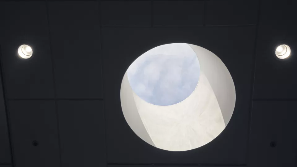round window, facing the blue sky